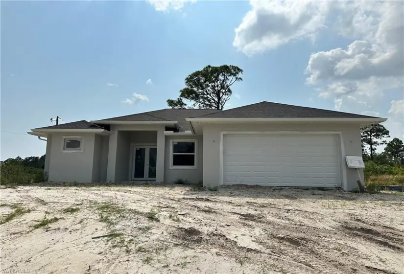 View of front of home with a garage