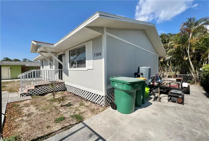 View of property exterior with a patio