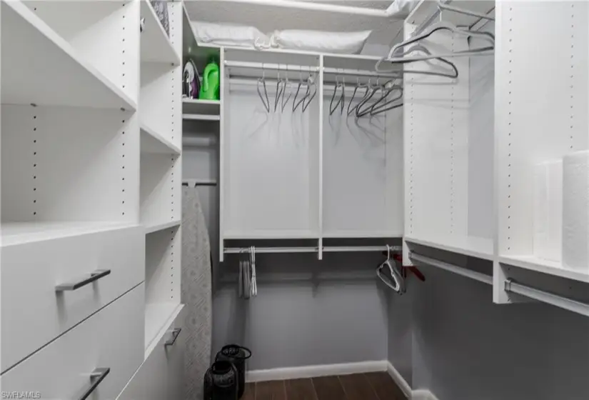 Walk-in closet with    build-ins